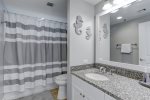 Primary en suite has tub/shower combo. 